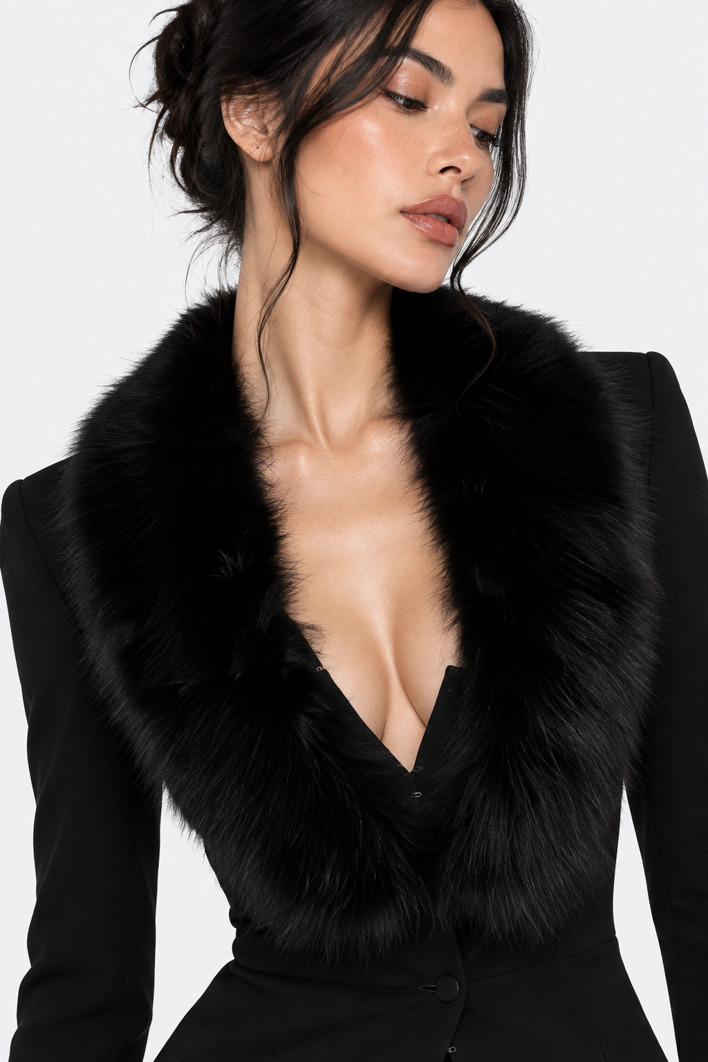 Black blazer set — plush collar and fitted waist close-up