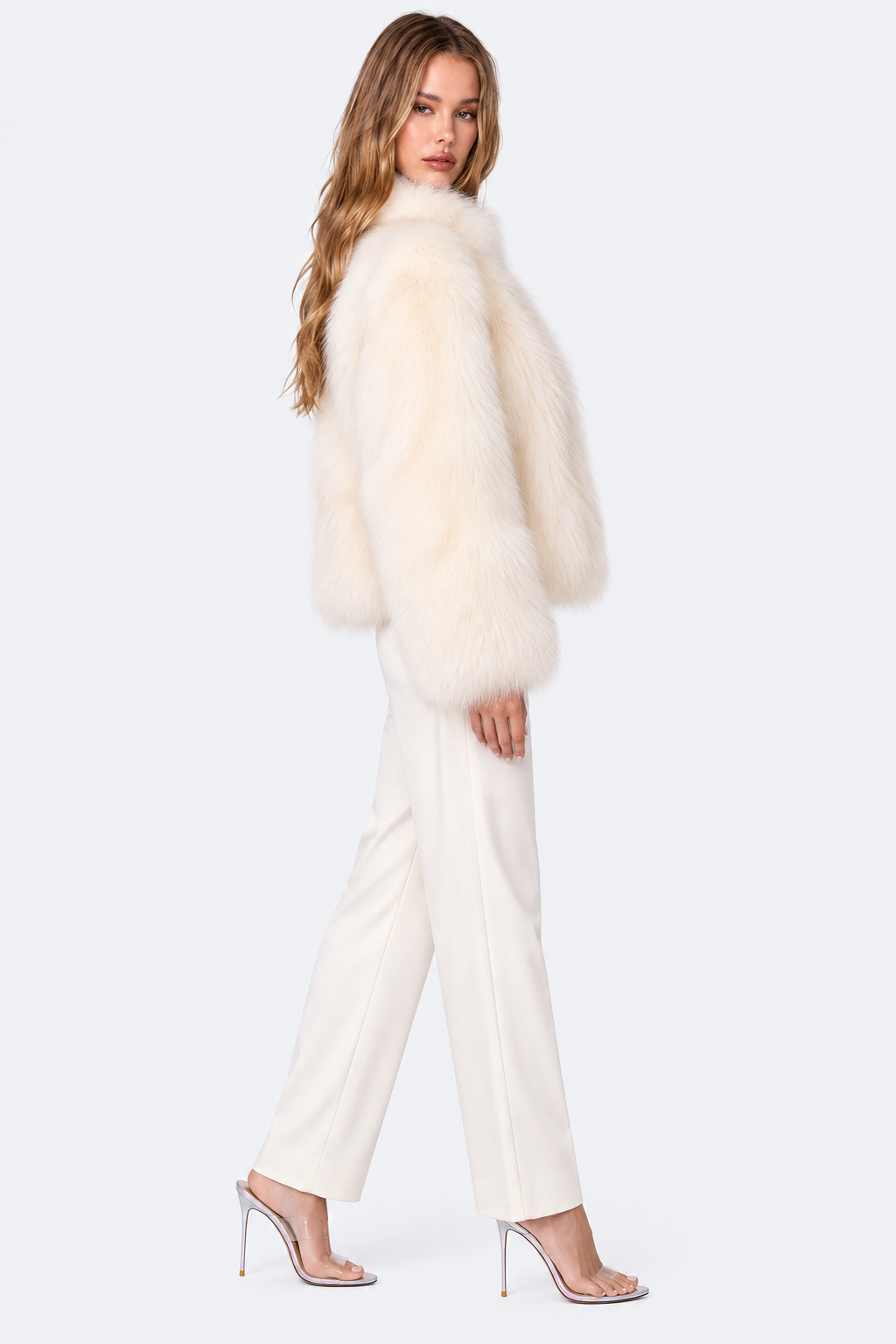 Ivory cropped fluffy coat, full-body side view