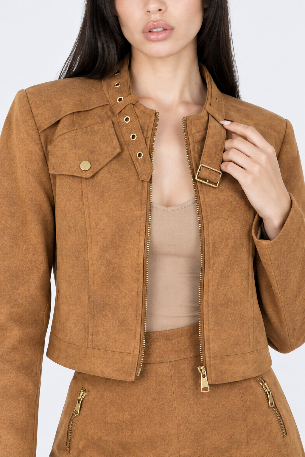 Camel jacket collar and hardware close-up