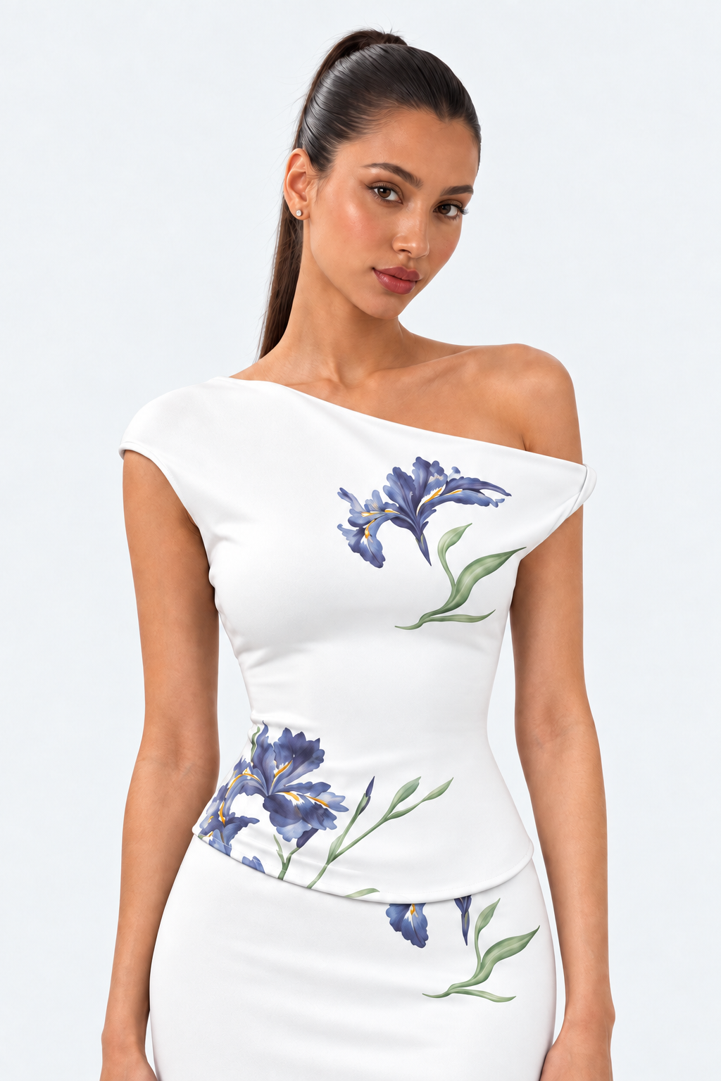 Asymmetric neckline and blue iris print on the white fitted bodice