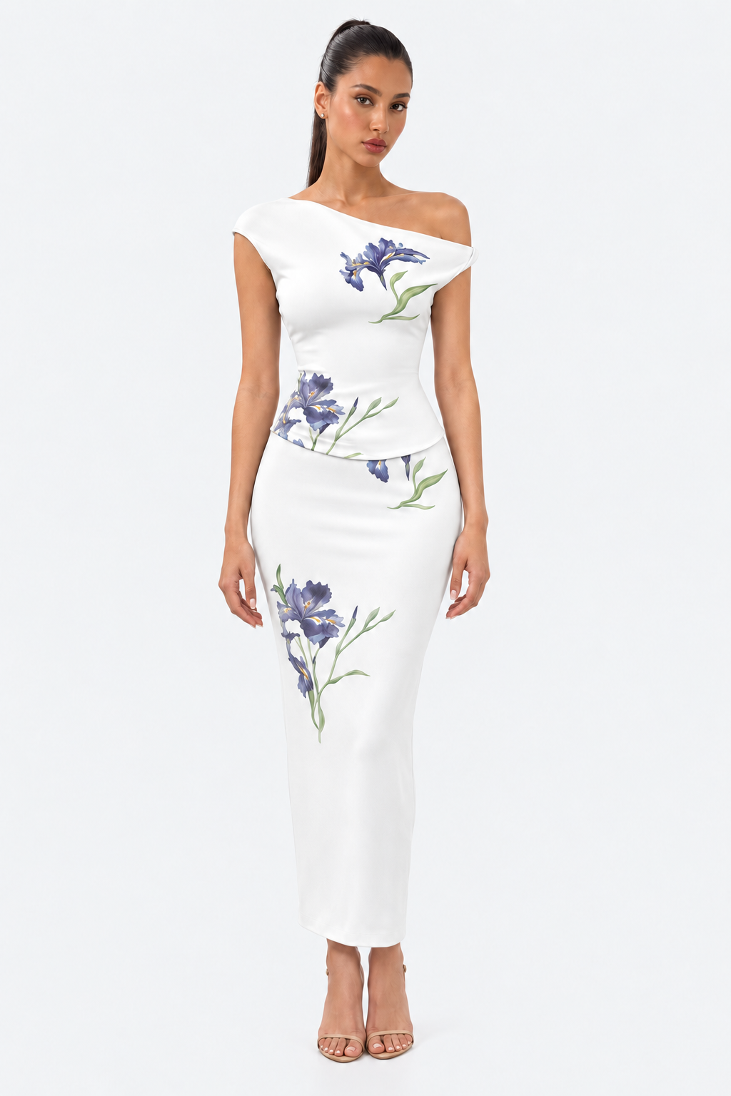 White floral top and skirt set with an asymmetric neckline and blue iris print, front view